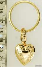 YBM heart shaped locket, engraved, Greek key accent  