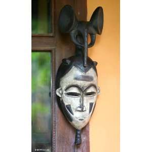  Ivoirian wood mask, Brave and Strong