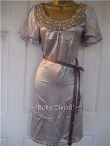 ribbon belt to accentuate the waist measurements up to bust 37 waist 