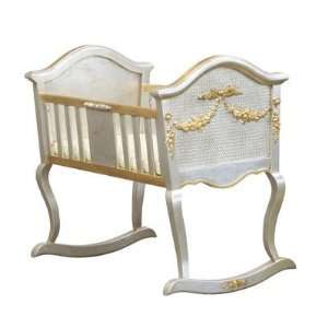   silver gold cradle with applique moulding and caning