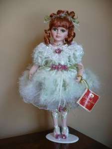   very beautiful porcelain angel doll. She comes with a base stand