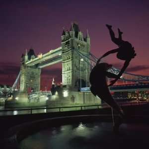 Statue and Tower Bridge Illuminated at Night, London, England, United 