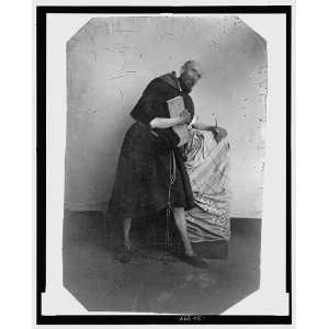   ,leaning on a cloth covered crate,1860 1900,Tintype