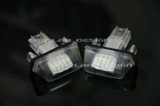 You are buying a set of two Brand New LED license plate bulbs to match 