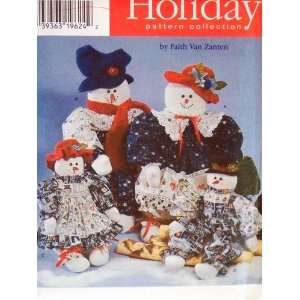   Pattern 7399. 22 & 33 Stuffed Snowman & Snow Woman Dolls & Clothes