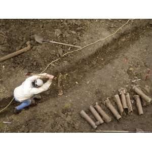  Man Puts in a Rainwater Drain Line at a Home in Lincoln 