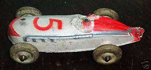 old painted cast rubber race car toy  