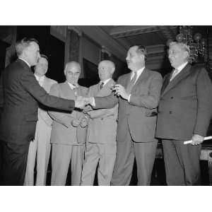  1938 photo Members congratulate chairman of congressional 
