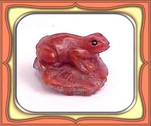 21.0ct FOSSILIZED RED HORN CORAL CARVED FROG **  