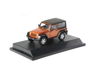 2012 JEEP WRANGLER RUBICON CRUSH ORANGE WITH CASE 1/43 BY GREENLIGHT 