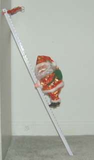   santa claus is coming to town tune and comes with a star ornament