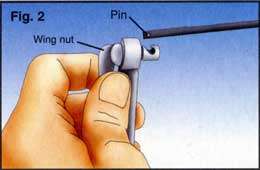 place the pins on the end of the blade into the holder grooves at each 