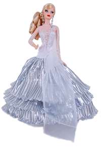 Holiday Barbie wears a silvery snowflake gown. View larger .