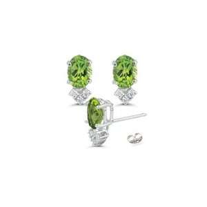  0.18 Cts Diamond & 10.01 Cts Peridot Earrings in Platinum 