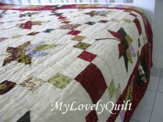 Up for sale is an elegant hand quilted and patchwork Twin size quilt 