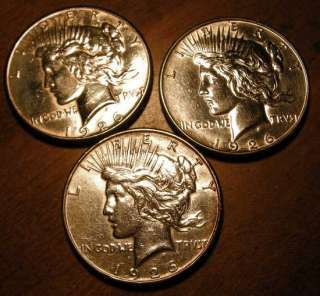   Dollar Trio all cleaned/whizzed. Ugly lot, but solid silver  