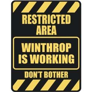  RESTRICTED AREA WINTHROP IS WORKING  PARKING SIGN