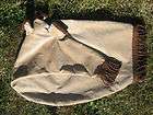 Beige corduroy bag cover with brown bullion fringe