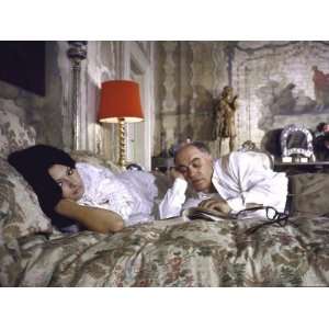  Actress Sophia Loren and Husband Carlo Ponti Lying Across 