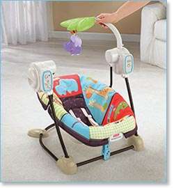   Spacesaver Swing and Seat   Toy bar swivels for easy access to baby