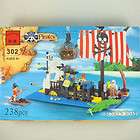 Lego pirate lot   Minifigures, parrot, boat, flags, map, guns, swords 