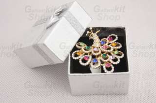 Peacock design ring with 14 colored RHINESTONES. It is charming and 