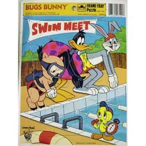   , and Tweety Bird at the Swim Meet Frame Tray Puzzle 